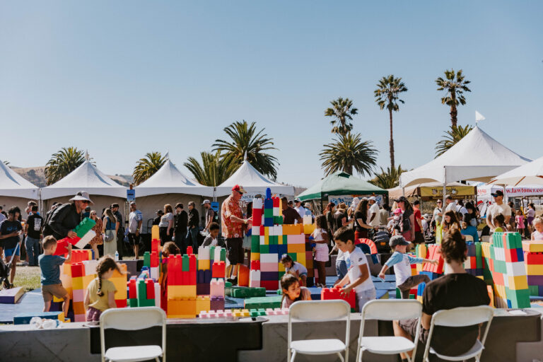 Children building with giant colorful blocks in the Mega Kids Zone